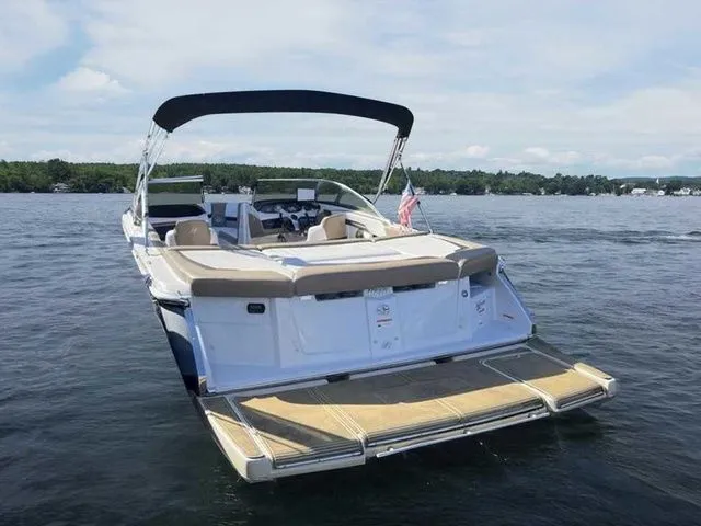 Slide: The Image of 2015 Four Winns H230 boat with swim platform on a lake. - 4