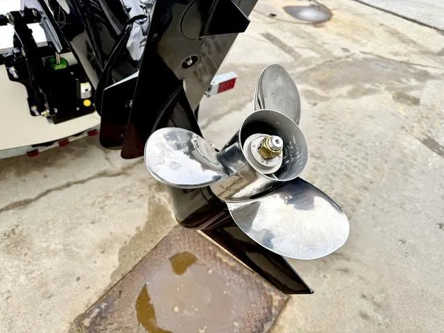 Slide: The Image of Propeller of 2025 Boston Whaler 150 Montauk boat on concrete surface. - 9