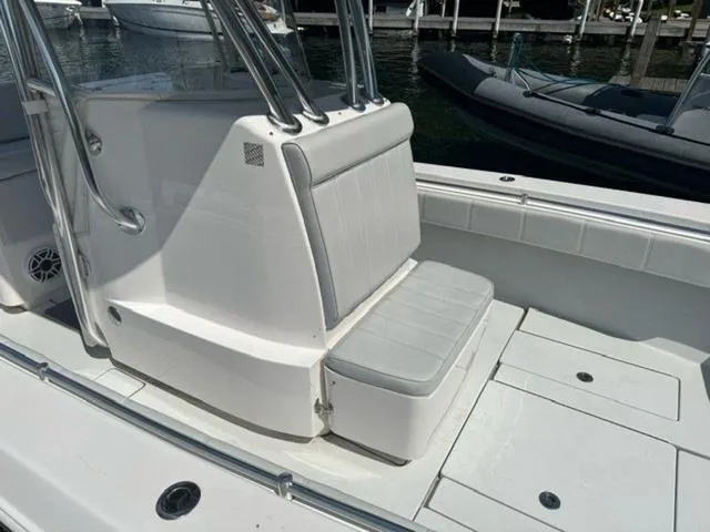 Slide: The Image of 2019 Contender 32ST boat interior with white seating and sleek design. - 8