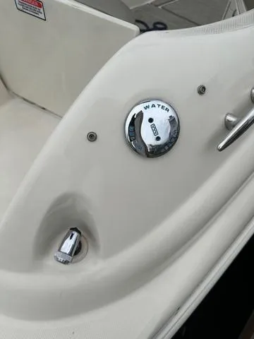 Slide: The Image of 2005 Sea Ray 240 Sundeck water fill cap and deck details. - 7