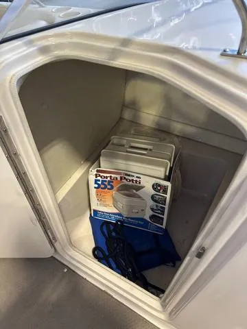Slide: The Image of 2003 Larson 234 ESCAPE boat storage with Porta Potti 565. - 12