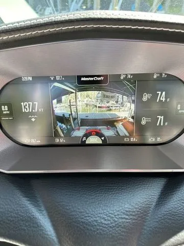 Slide: The Image of 2023 MasterCraft X24 dashboard display with navigation and performance metrics. - 15
