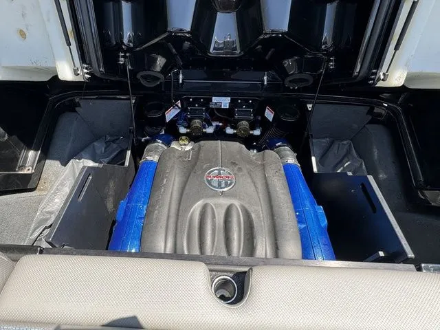 Slide: The Image of 2018 MasterCraft X23 engine compartment with blue accents and detailed components. - 10