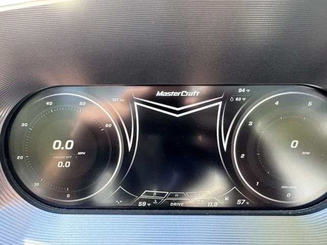 Slide: The Image of Dashboard of a 2018 MasterCraft X23 boat, displaying speed and RPM gauges. - 21