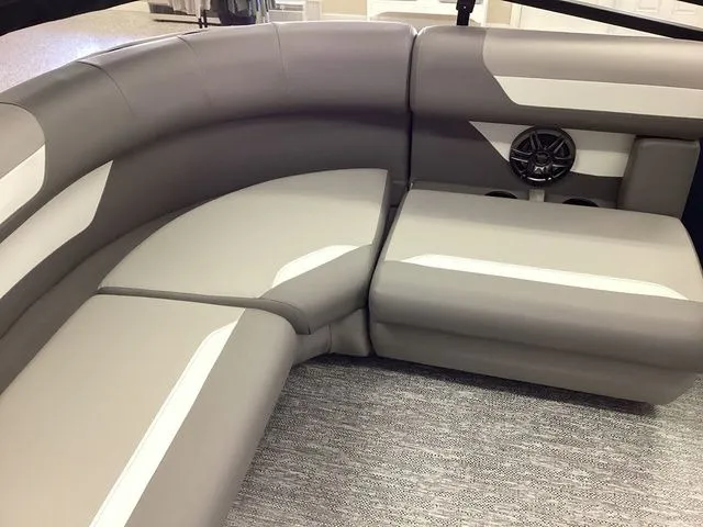 Slide: The Image of Luxurious seating in 2025 Premier 200 SUNSCAPE RE-CL boat, featuring modern design and speaker system. - 16