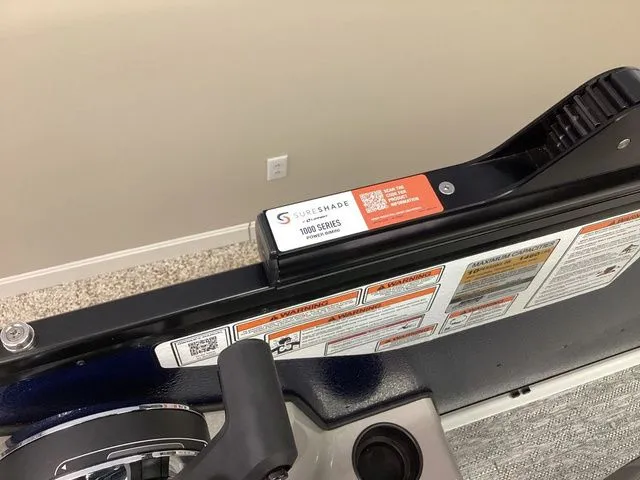 Slide: The Image of SureShade 1000 Series on Premier 200 SUNSCAPE RE-CL 2025 boat, featuring safety instructions. - 17