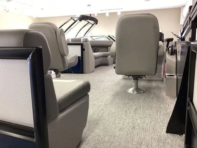 Slide: The Image of 2025 Premier 200 SUNSCAPE RE-CL boat interior with gray seating and modern design. - 8
