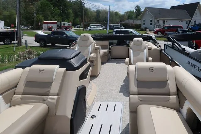 Slide: The Image of 2024 Premier 230 Solaris RF pontoon boat with luxurious seating and modern design. - 15