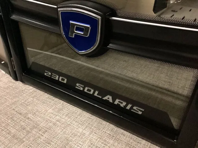 Slide: The Image of 2024 Premier 230 Solaris RF boat logo and model name on display. - 16