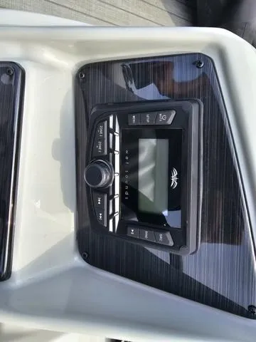 Slide: The Image of Control panel of 2025 Sylvan Mirage 8520 CLZ DH boat, featuring modern interface. - 10