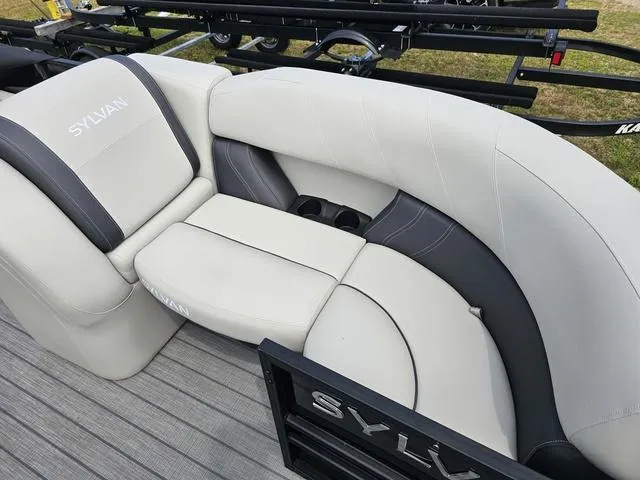 Slide: The Image of Luxurious seating on 2025 Sylvan Mirage 8520 CLZ DH pontoon boat, featuring sleek design and comfort. - 5