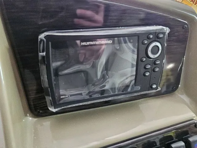 Slide: The Image of Fishfinder display on 2025 Sylvan Mirage X1 boat dashboard. - 10