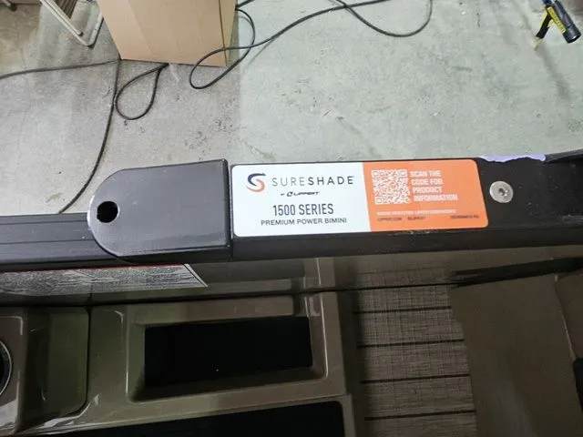 Slide: The Image of Sureshade 1500 Series Premium Power Bimini on Sylvan Mirage X1, 2025 model. - 11