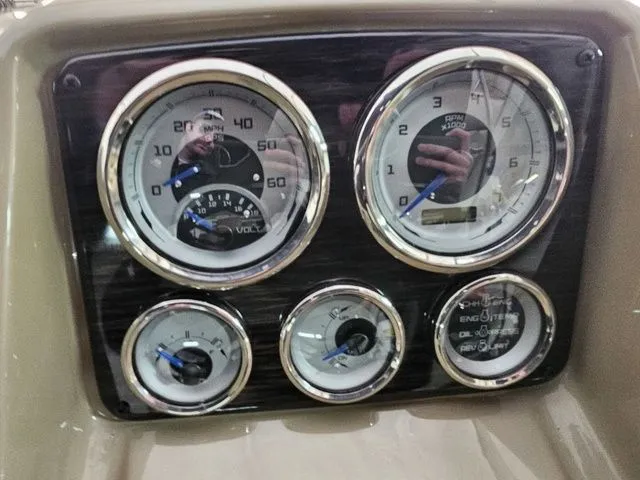 Slide: The Image of Dashboard of 2025 Sylvan Mirage X1 with gauges and dials. - 9