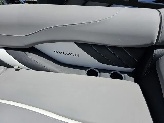 Slide: The Image of 2023 Sylvan S3 LZ boat interior with gray seating and cup holders. - 11