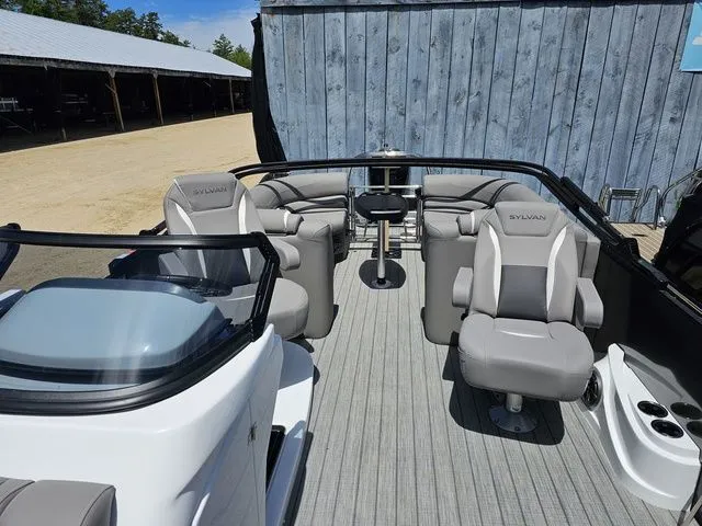 Slide: The Image of 2023 Sylvan S3 LZ boat interior with gray seating and modern design. - 15
