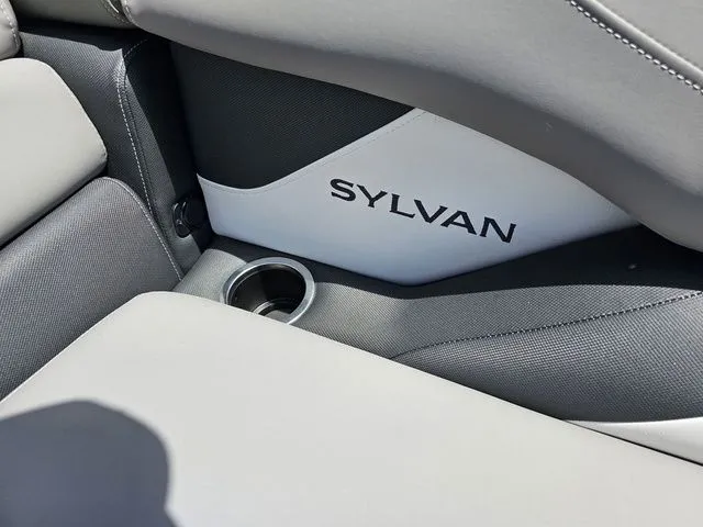 Slide: The Image of 2023 Sylvan S3 LZ boat interior with cup holder and logo detail. - 16