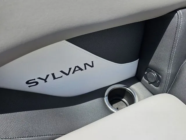 Slide: The Image of Interior of 2023 Sylvan S3 LZ boat with cup holder and logo detail. - 17