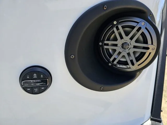 Slide: The Image of Outdoor speaker system on 2023 Sylvan S3 LZ boat, featuring JL Audio components. - 7