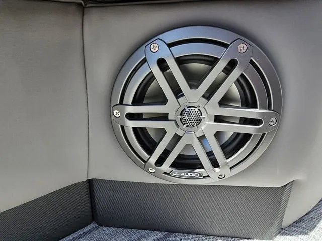 Slide: The Image of 2023 Sylvan S3 LZ boat featuring a JL Audio speaker in a sleek interior design. - 9