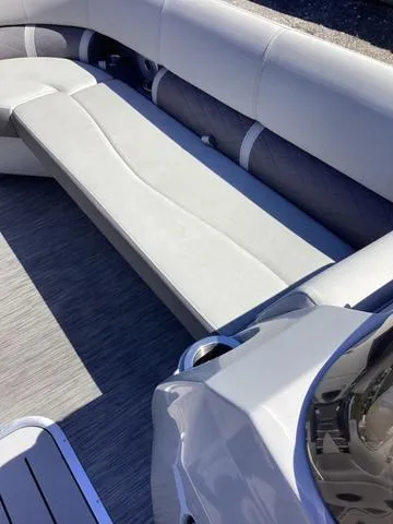 Slide: The Image of 2022 Bennington 24 LSRC boat interior with sleek seating and modern design. - 11