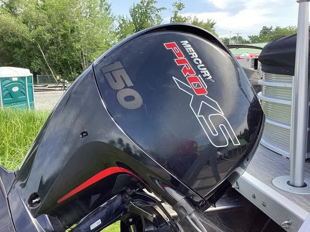 Slide: The Image of Mercury Pro XS 150 outboard motor on 2022 Bennington 24 LSRC boat. - 3