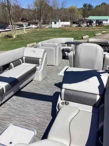 Slide: The Image of 2022 Bennington 24 LSRC pontoon boat with spacious seating and modern design. - 4