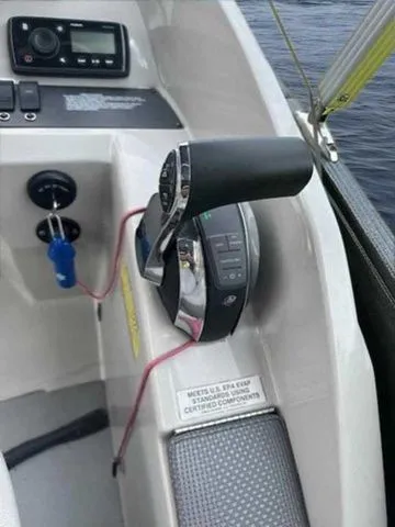 Slide: The Image of Control panel of a 2017 Crest 250 SL boat with throttle and navigation equipment. - 7