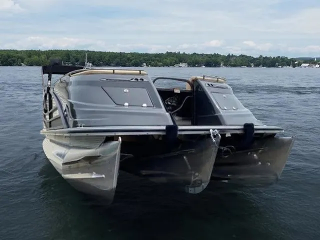 Slide: The Image of 2017 Crest Savannah 250 NX L pontoon boat on a serene lake. - 3