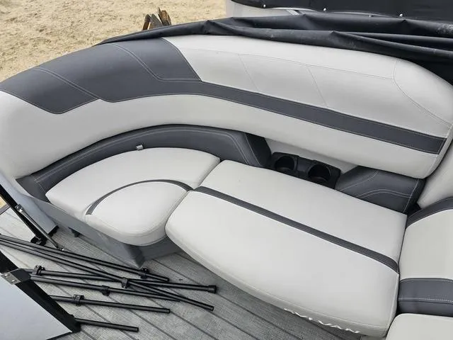Slide: The Image of Luxurious seating on 2022 Sylvan L-3 CLZ boat, featuring sleek gray upholstery. - 10