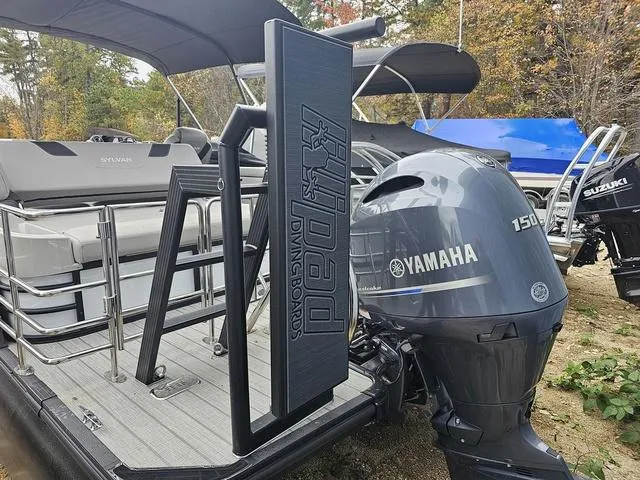 Slide: The Image of 2022 Sylvan L-3 CLZ boat with Yamaha 150 engine and diving board attachment. - 8