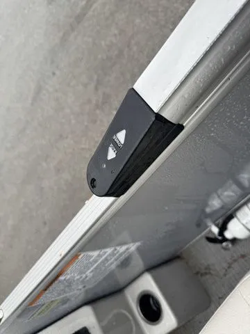 Slide: The Image of 2022 Sylvan 8522 LZ boat detail, featuring a corner bumper and sleek design. - 24