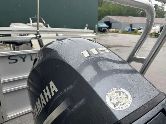 Slide: The Image of Yamaha 115 outboard motor on 2022 Sylvan 8522 LZ boat, showcasing ultra-low emissions. - 7