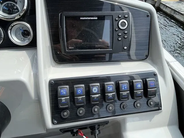 Slide: The Image of Control panel of a 2022 Sylvan 8520 LZ boat with Humminbird electronics. - 15