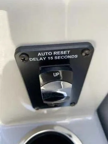 Slide: The Image of Auto reset switch with 15-second delay on 2023 Sylvan X1. - 15