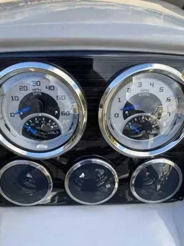 Slide: The Image of Dashboard of 2023 Sylvan X1 boat with speedometer and fuel gauges. - 4