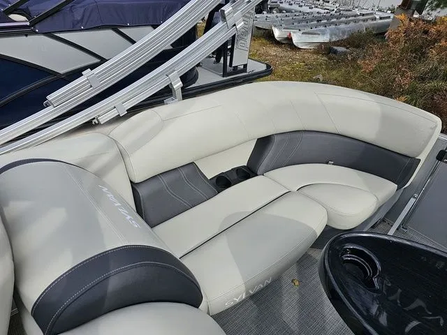 Slide: The Image of 2023 Sylvan 8524 Mirage LZ boat with luxurious seating and cup holders. - 10