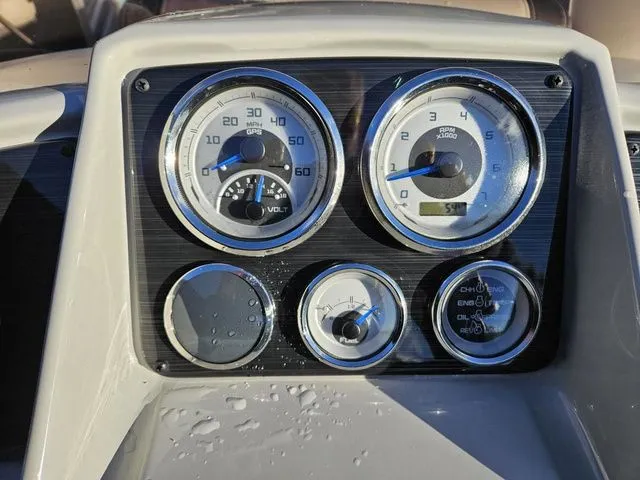 Slide: The Image of Dashboard of 2023 Sylvan 8524 Mirage LZ with gauges and controls. - 6