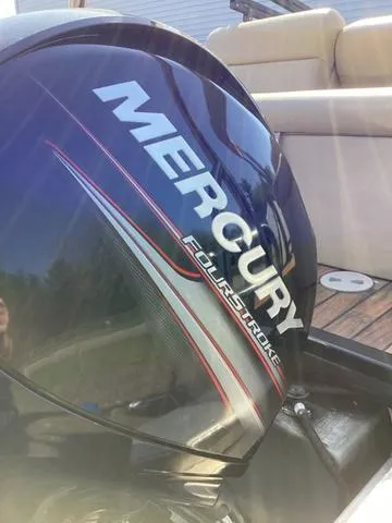 Slide: The Image of Mercury FourStroke engine on 2018 Harris 230 Sunliner Sport boat, close-up view. - 16