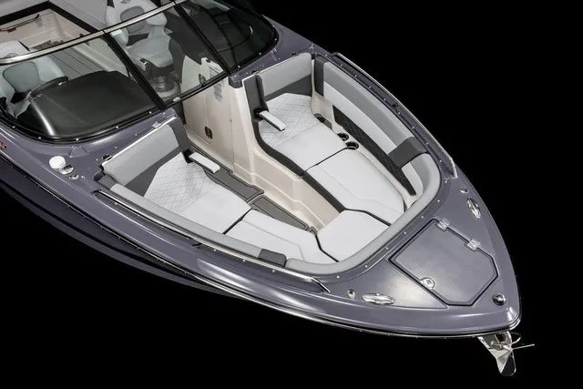 Slide: The Image of 2025 Chaparral 2870 SSX boat with sleek design and spacious seating. - 10