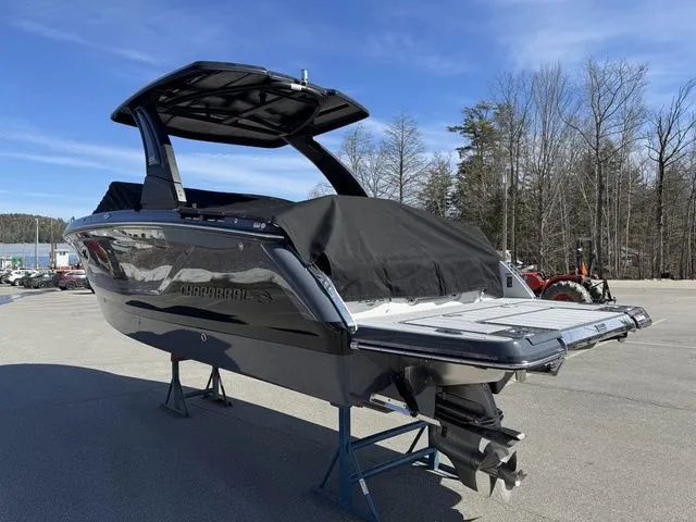 Slide: The Image of 2025 Chaparral 2870 SSX boat on display, featuring sleek design and modern features. - 5