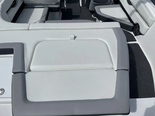 Slide: The Image of 2023 Cobalt CS22 boat interior with white and gray seating, showcasing modern design and comfort. - 20