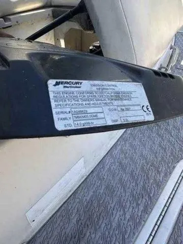 Slide: The Image of Mercury engine label on 2007 Sea Ray 210 Select boat, showing specifications and serial number. - 6