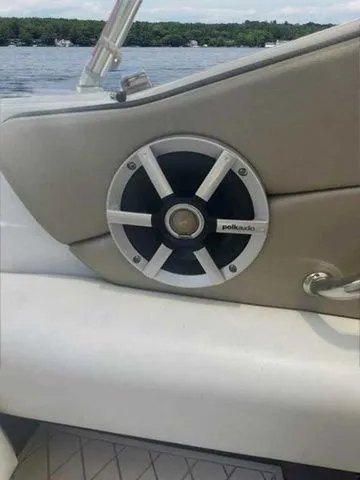Slide: The Image of Speaker on 2007 Sea Ray 210 Select boat, with lake view in background. - 8