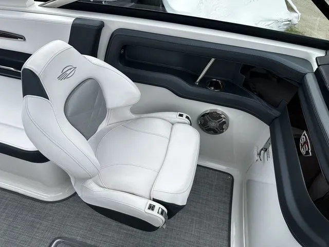 Slide: The Image of 2019 Chaparral 277SX boat interior with white and gray seating. - 15