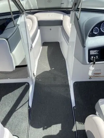 Slide: The Image of 2016 Cobalt 200S boat interior with gray carpet and white seating. - 12