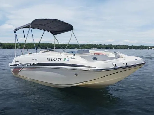 Slide: The Image of 2019 Hurricane 188 I/O boat with canopy on calm water. - 1