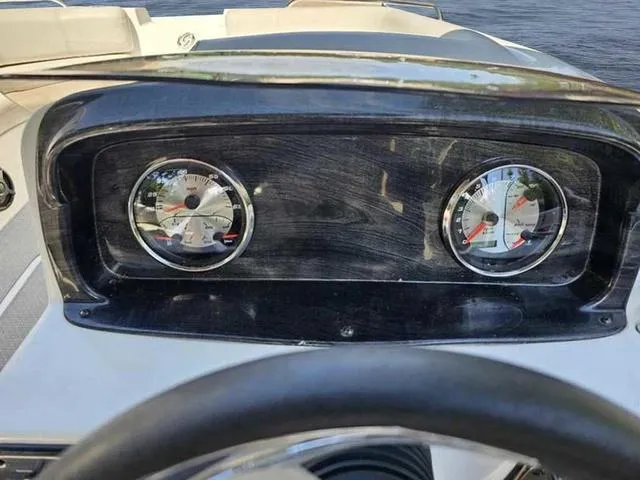 Slide: The Image of Dashboard of a 2019 Hurricane 188 I/O boat with dual gauges. - 8