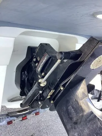 Slide: The Image of 2007 Bayliner HSP 190 boat engine close-up, showcasing mechanical components. - 18