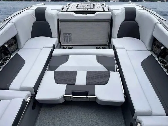 Slide: The Image of 2024 MasterCraft X24 boat interior with luxurious seating and modern design. - 20